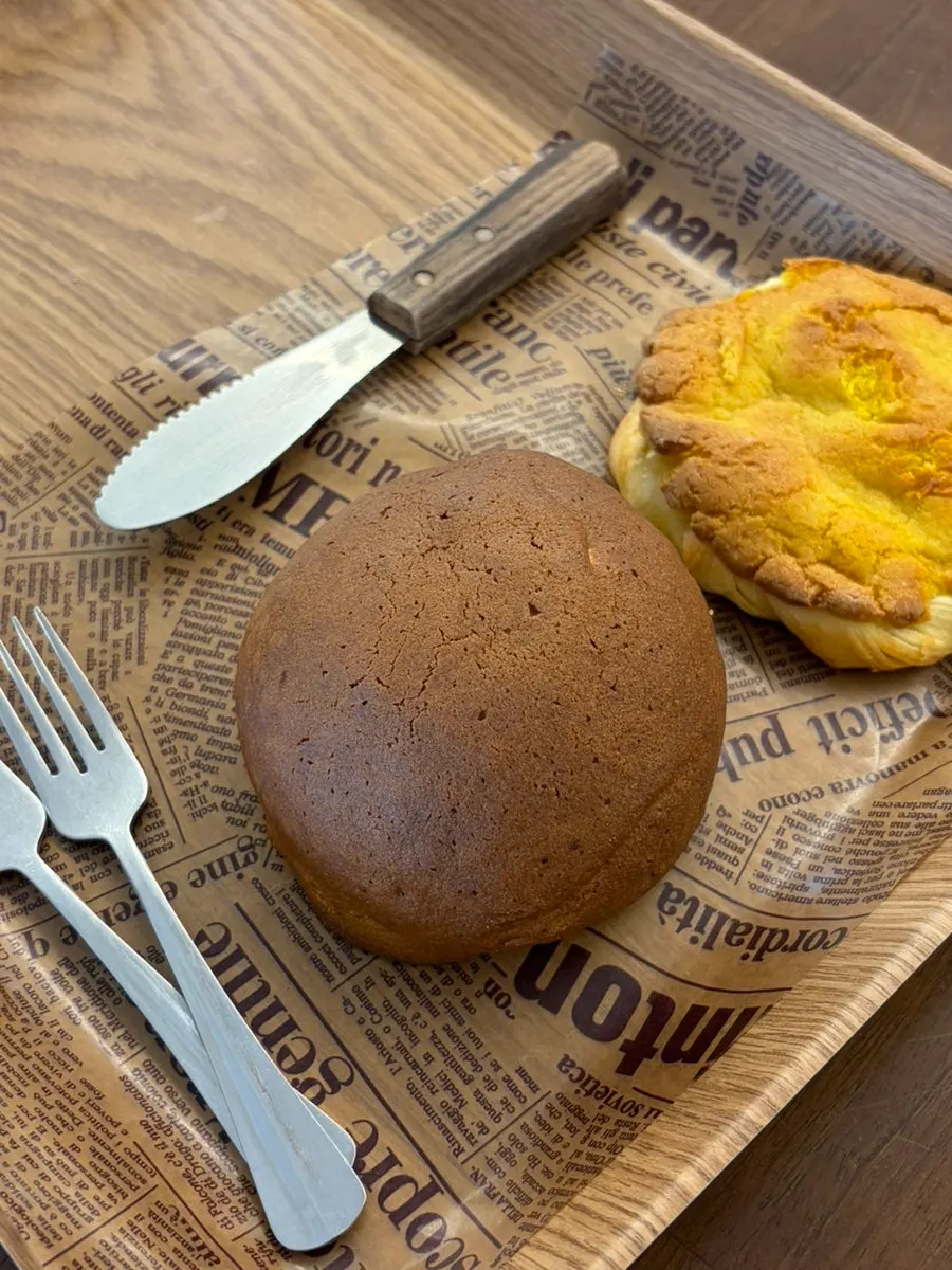 A scoop of tofu ice cream dipped in bean powder