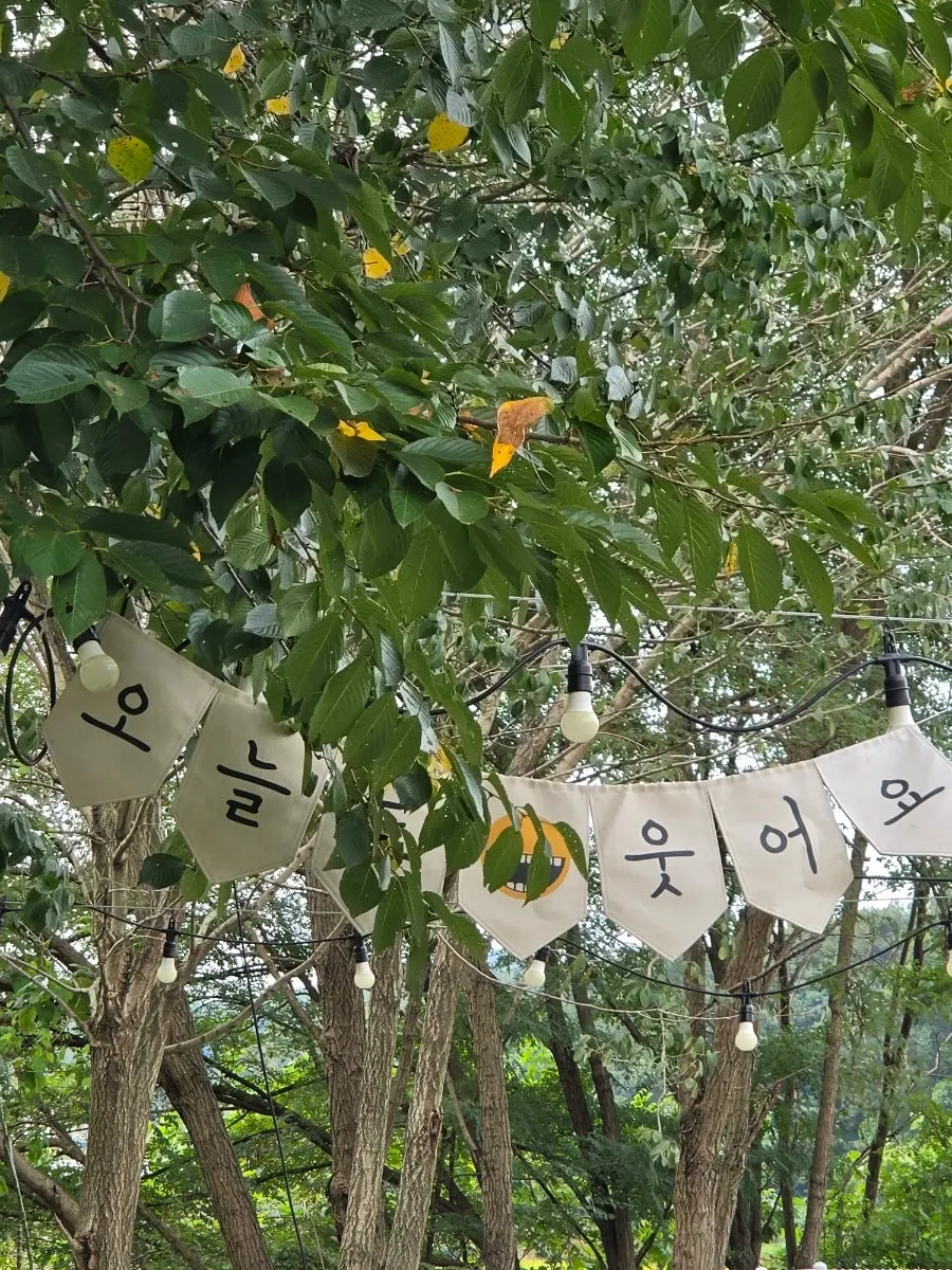 Outdoor tables and garden at MIMI Coffee Mill