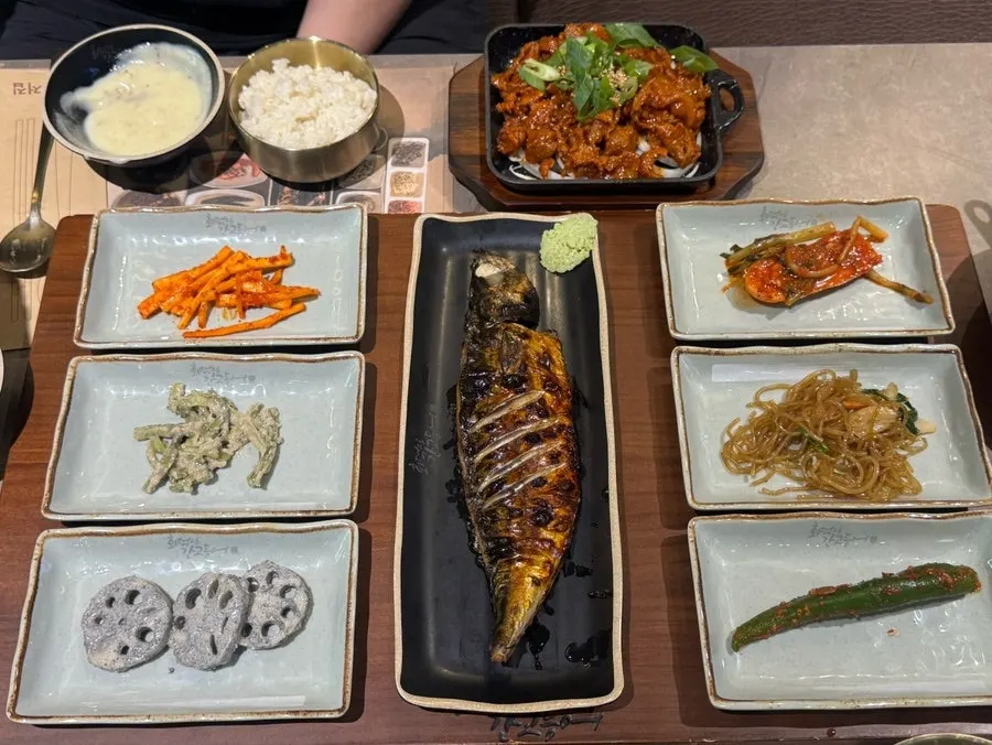 Plate of bulgogi and tteokbokki brought to the table