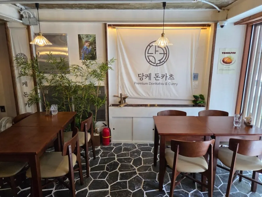 Sunlit seating inside Dangke Donkatsu