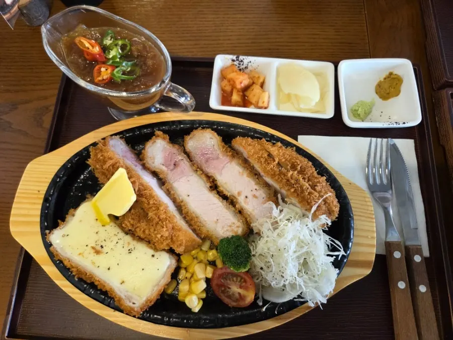 Cross-section of crisp-outside, juicy-inside tenderloin tonkatsu
