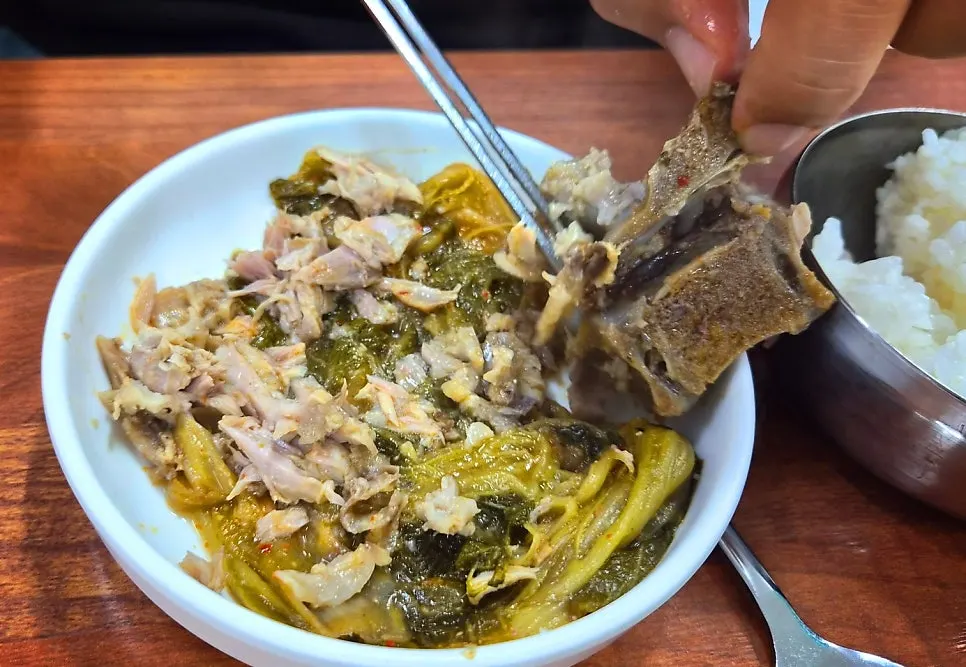 Meat picked off the bone from the pork bone soup
