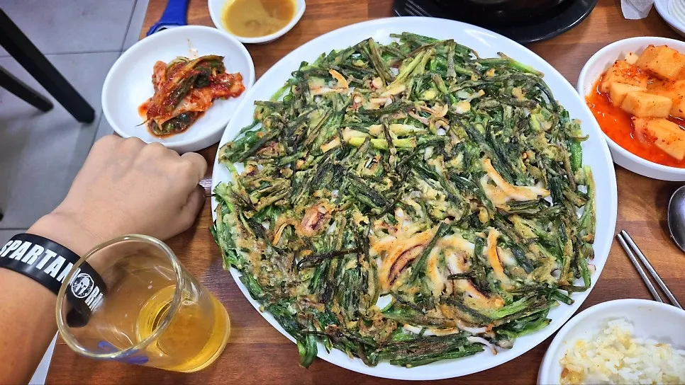 Squid-chive pancake loaded with squid