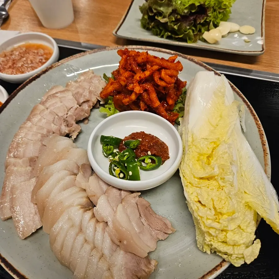 Tender bossam served with lettuce wraps