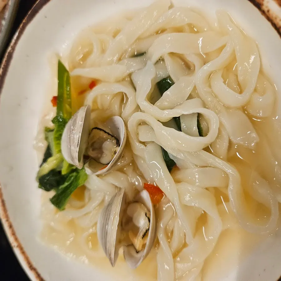 Dongjuk clam kalguksu with deep savory flavor