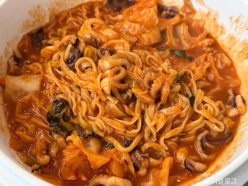Spicy kalguksu piled high with plump octopus