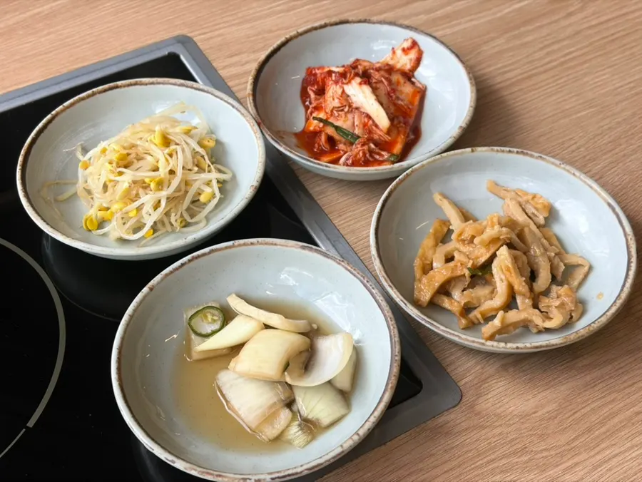 Home-style banchan spread at Cheongun Bossam