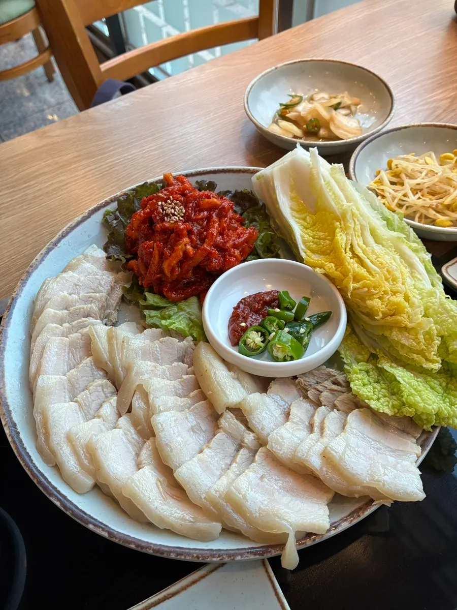 Vertical shot of the bossam spread at Dangsan's Cheongun Bossam