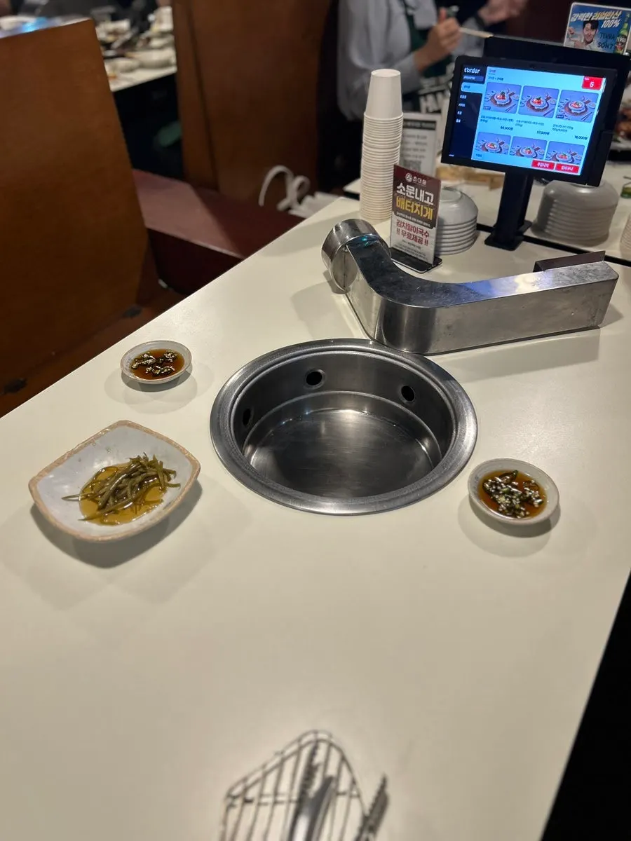 Table set for two at Chodaechang Dangsan Station