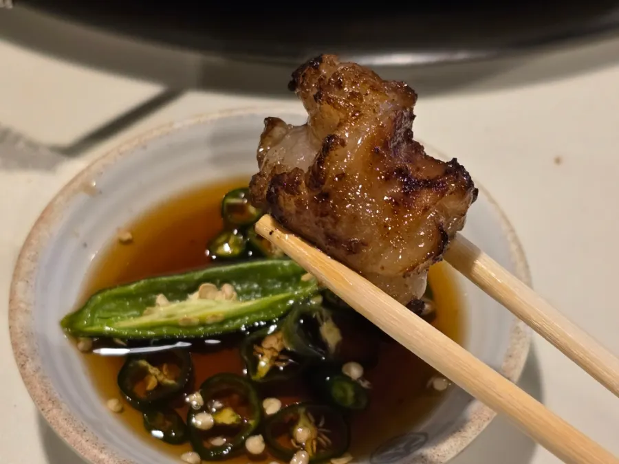 A chewy, well-cooked piece of daechang