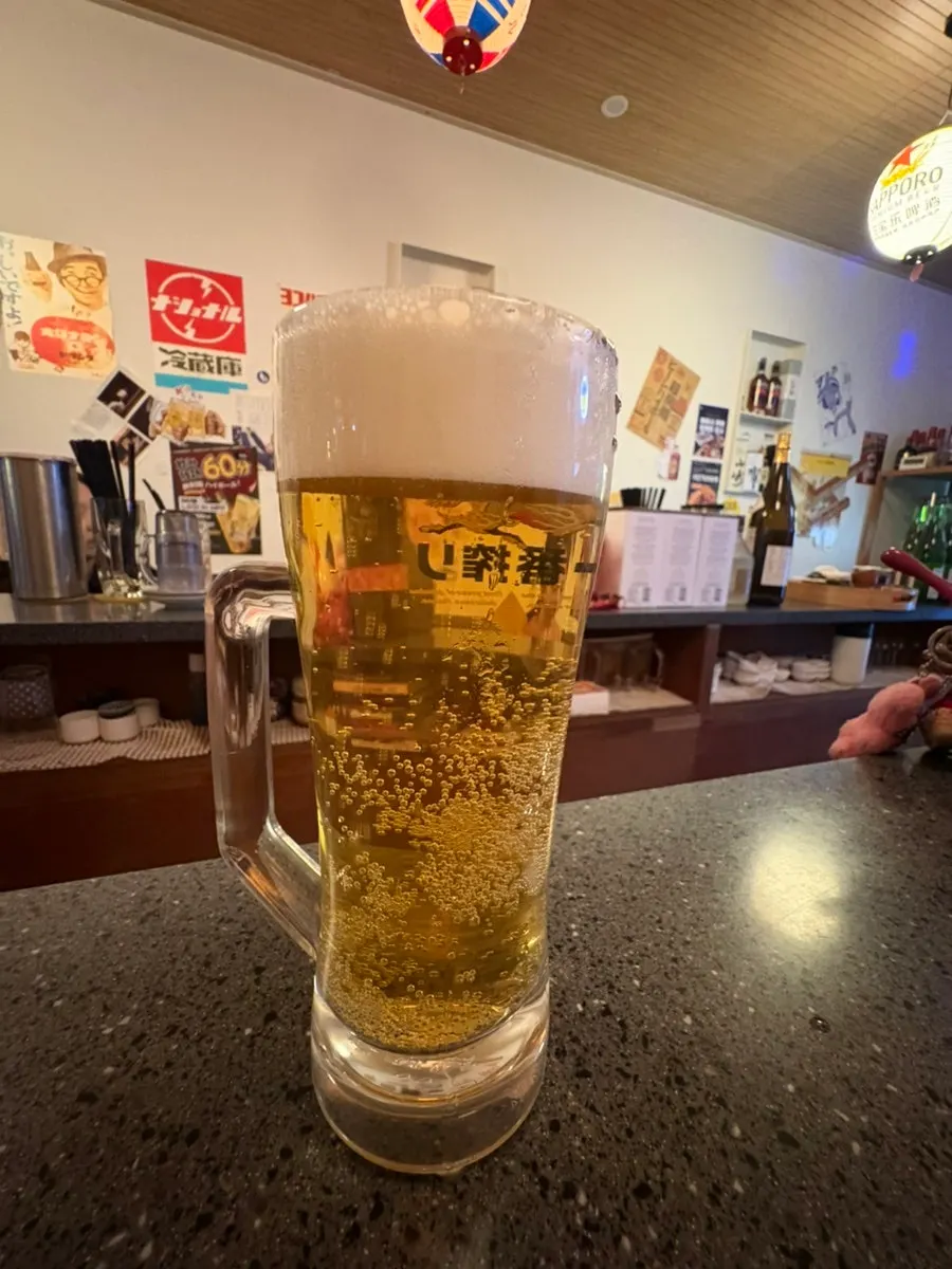 거품이 올라간 기린 생맥주 잔