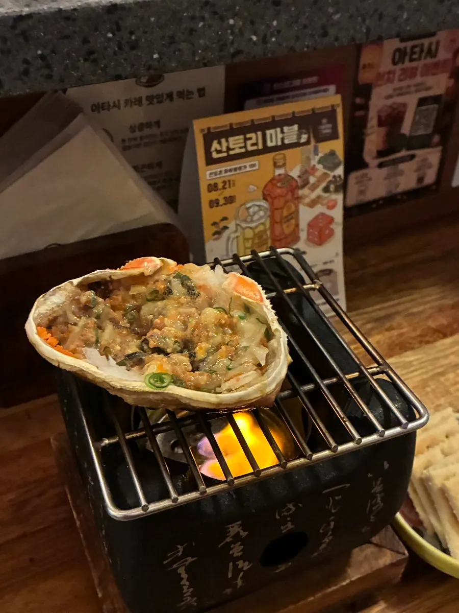 불판 위에 올려 나온 게딱지 리조또