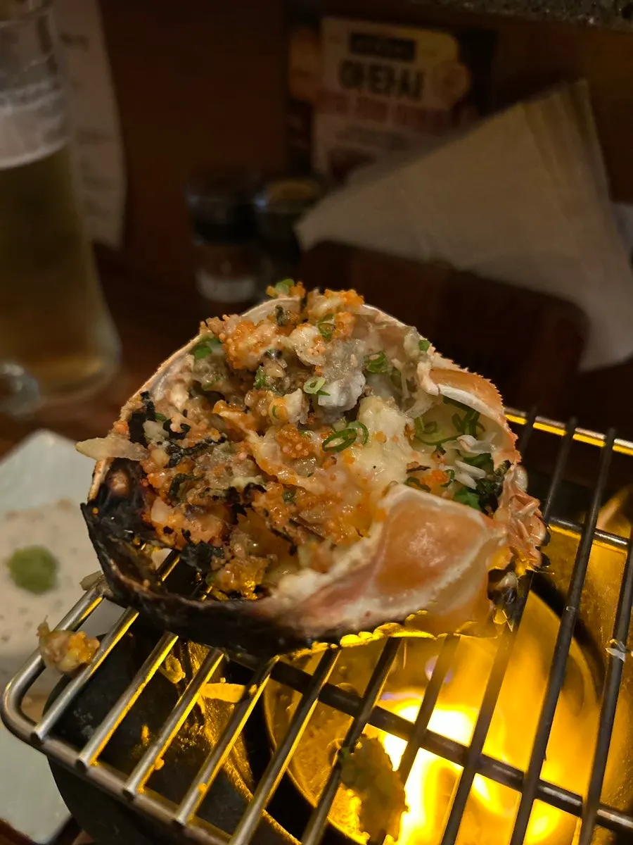 A bowl of crab roe gratin in the shell