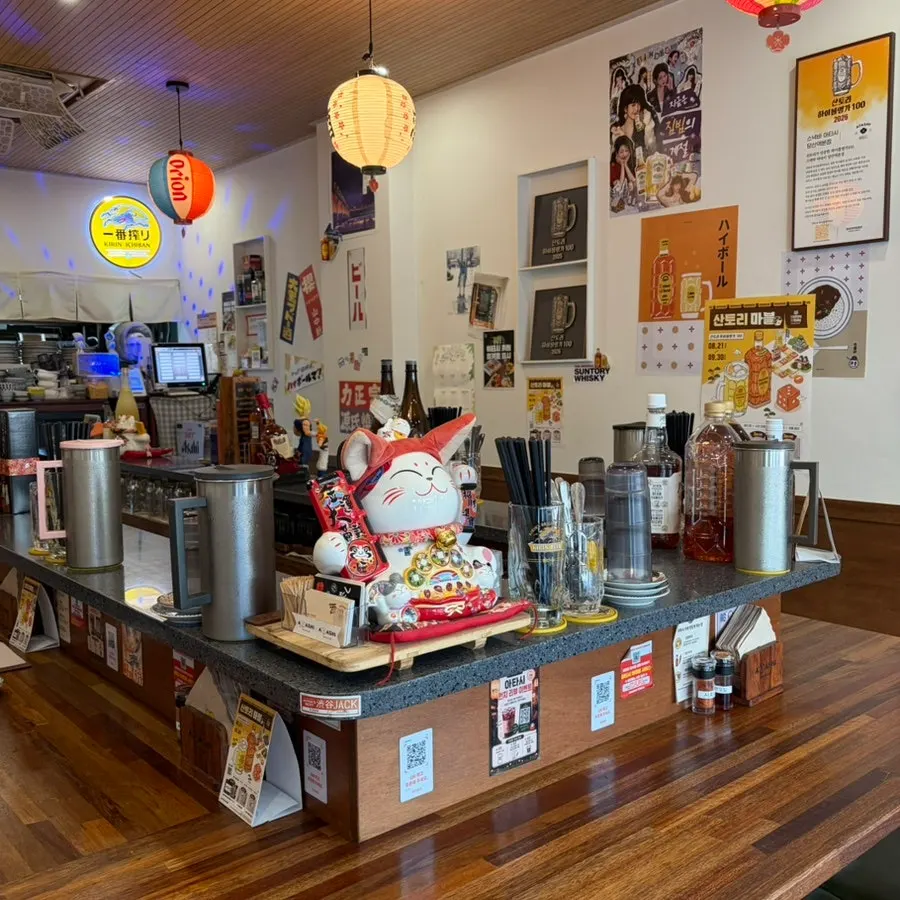 Outside view of Snack Bar Atashi with an izakaya atmosphere