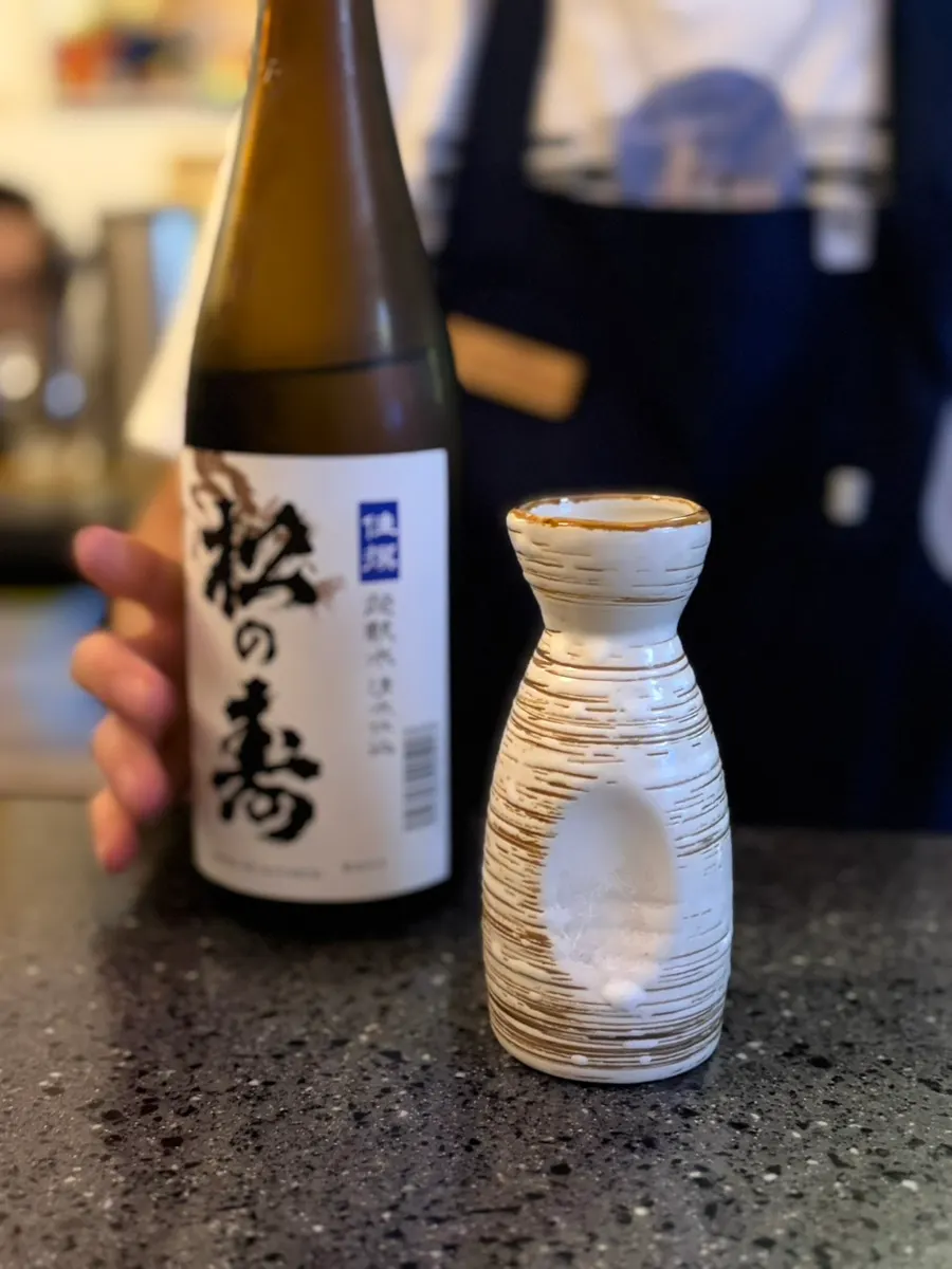 A display of sake cups to choose from