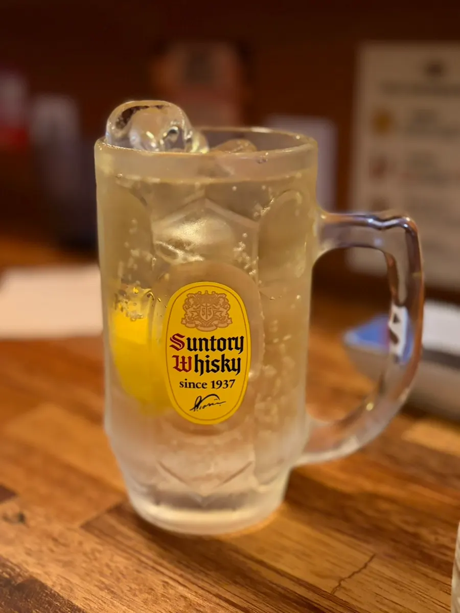 Sake poured into the hand-picked cup