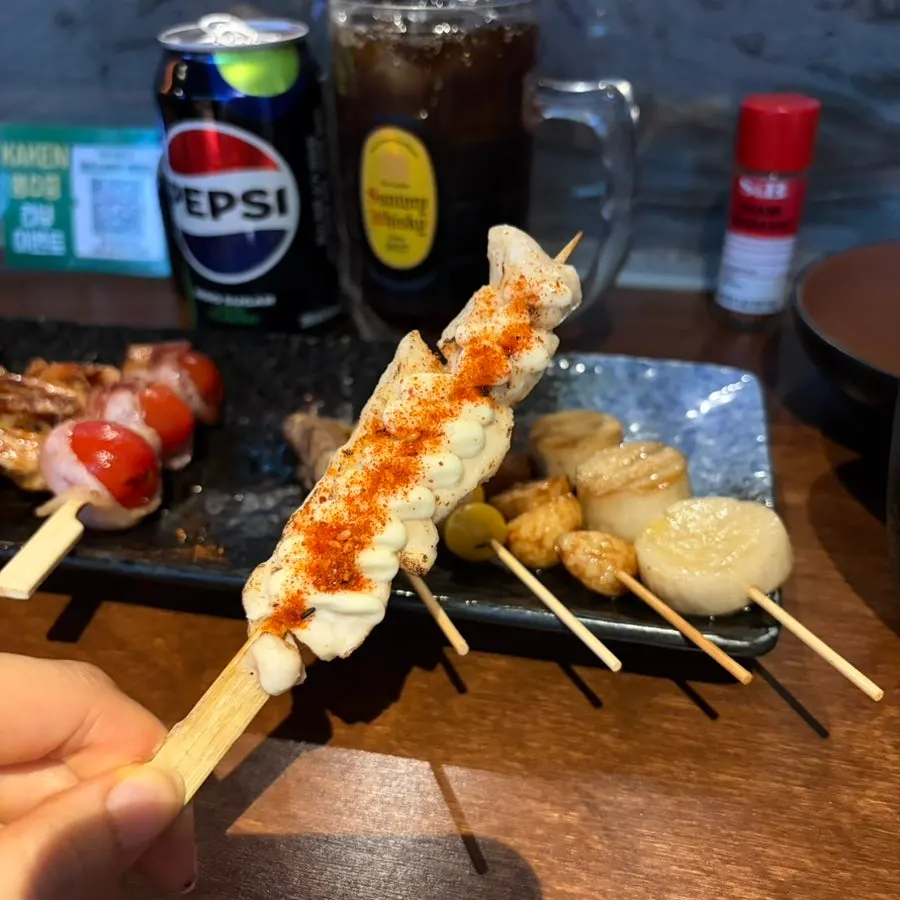 Shrimp skewer and chicken skin skewer
