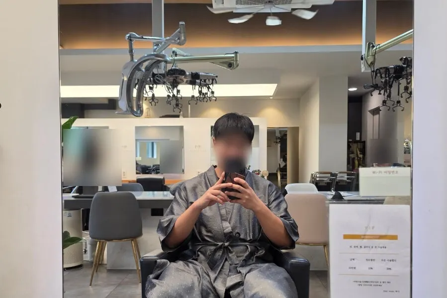 Styling chair and consultation seat in front of the mirror before treatment