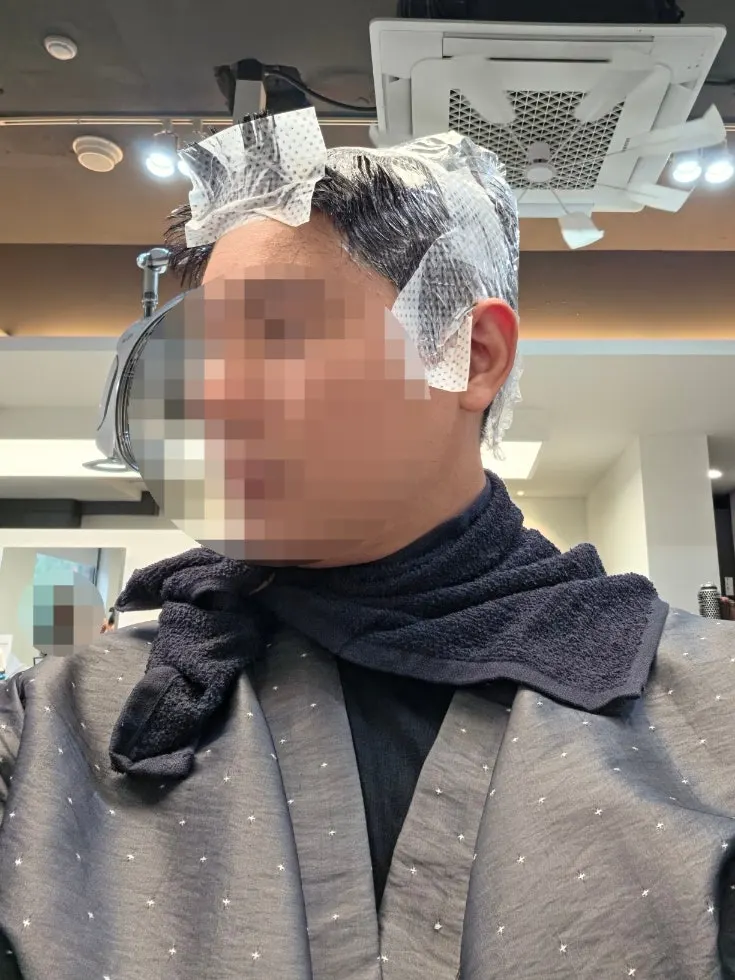Down perm solution applied to the fringe and top
