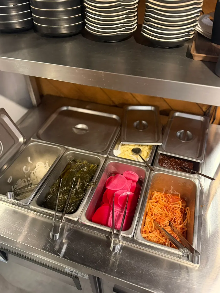 A plate with myeongi namul and lettuce wraps