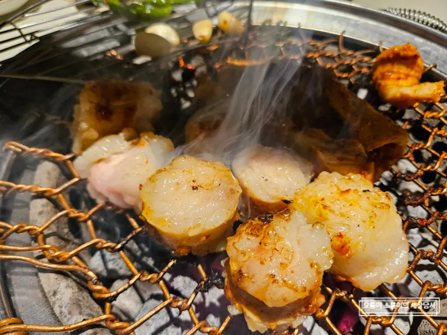 Daechang, teuk-yang, and makchang from Assorted Grill Set B on the charcoal