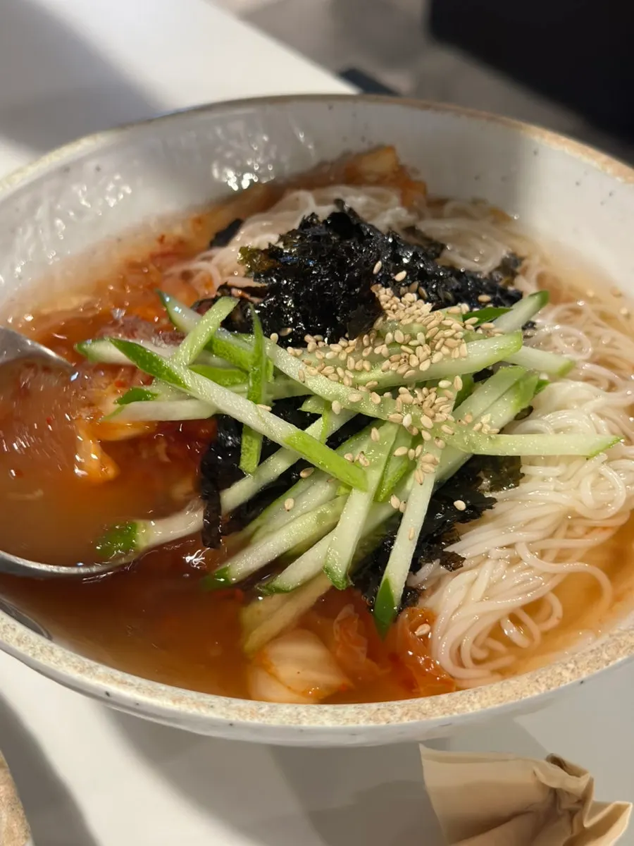 Spicy doenjang sulbap eaten with the assorted grill