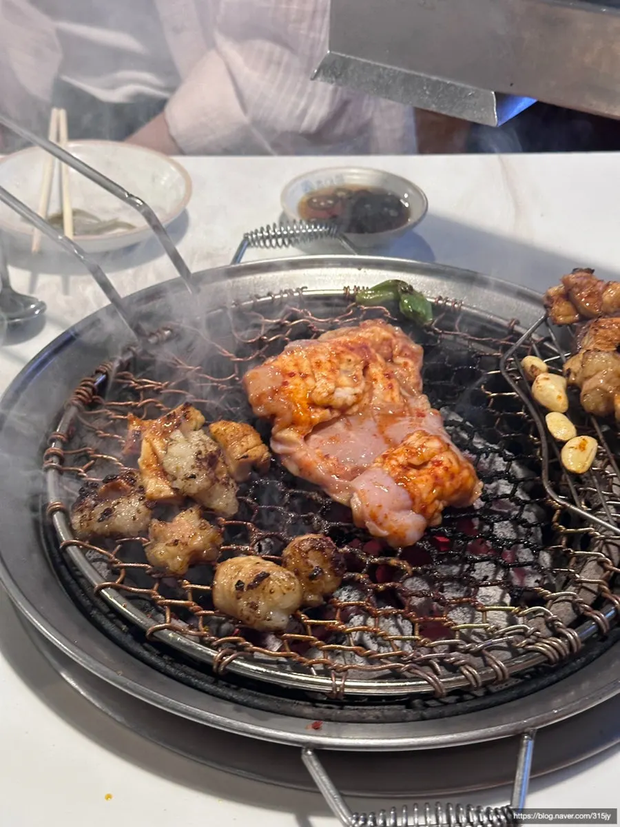 Meat cooking on the grill