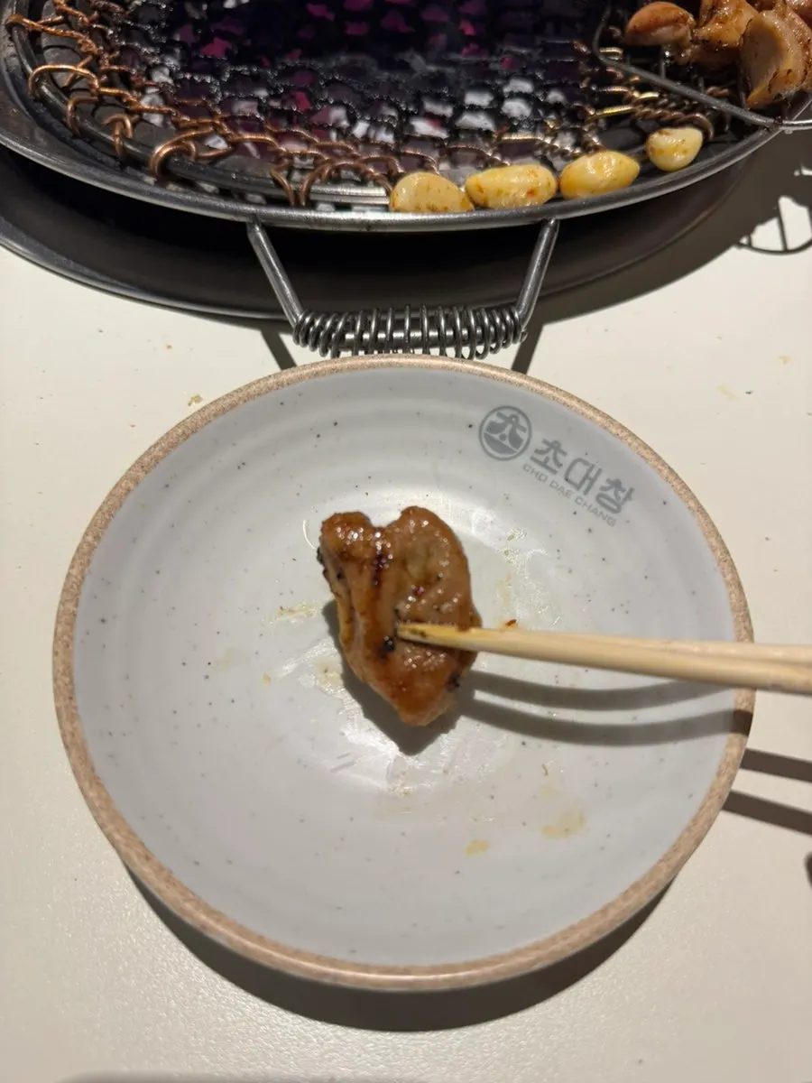 Thick makchang grilling over charcoal