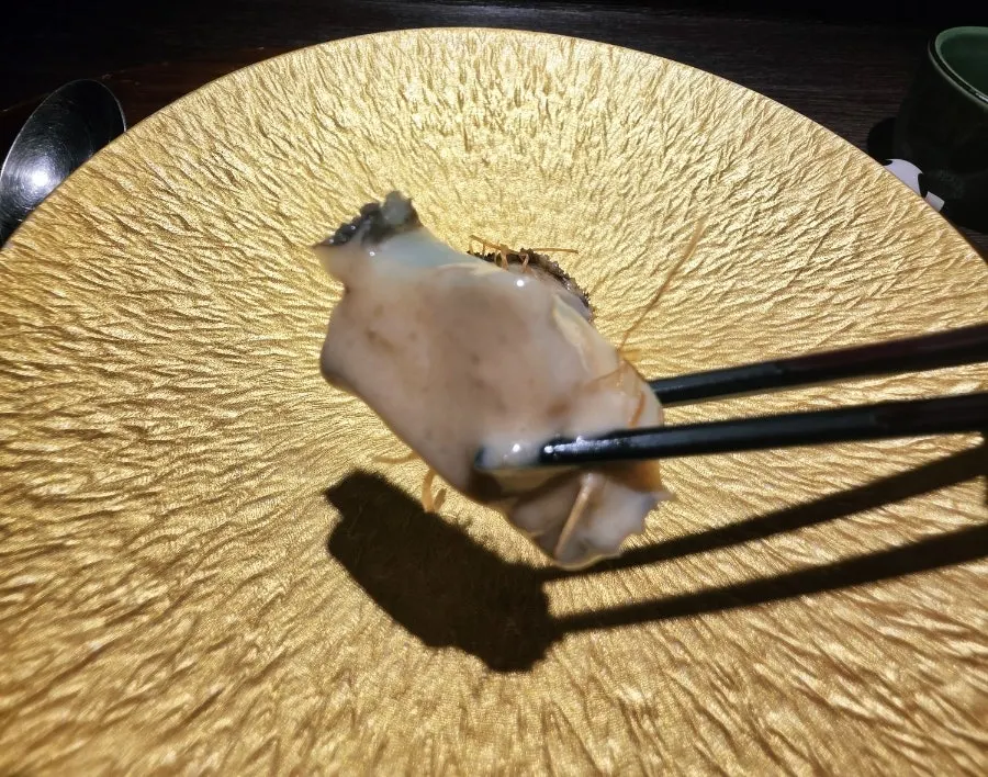 Steamed abalone with snow crab innards sauce in Danya's dinner course