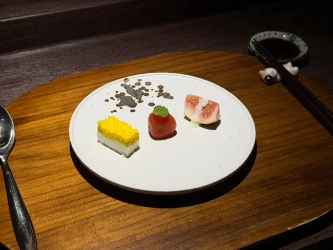 Egg, fig, and marinated tomato appetizer trio