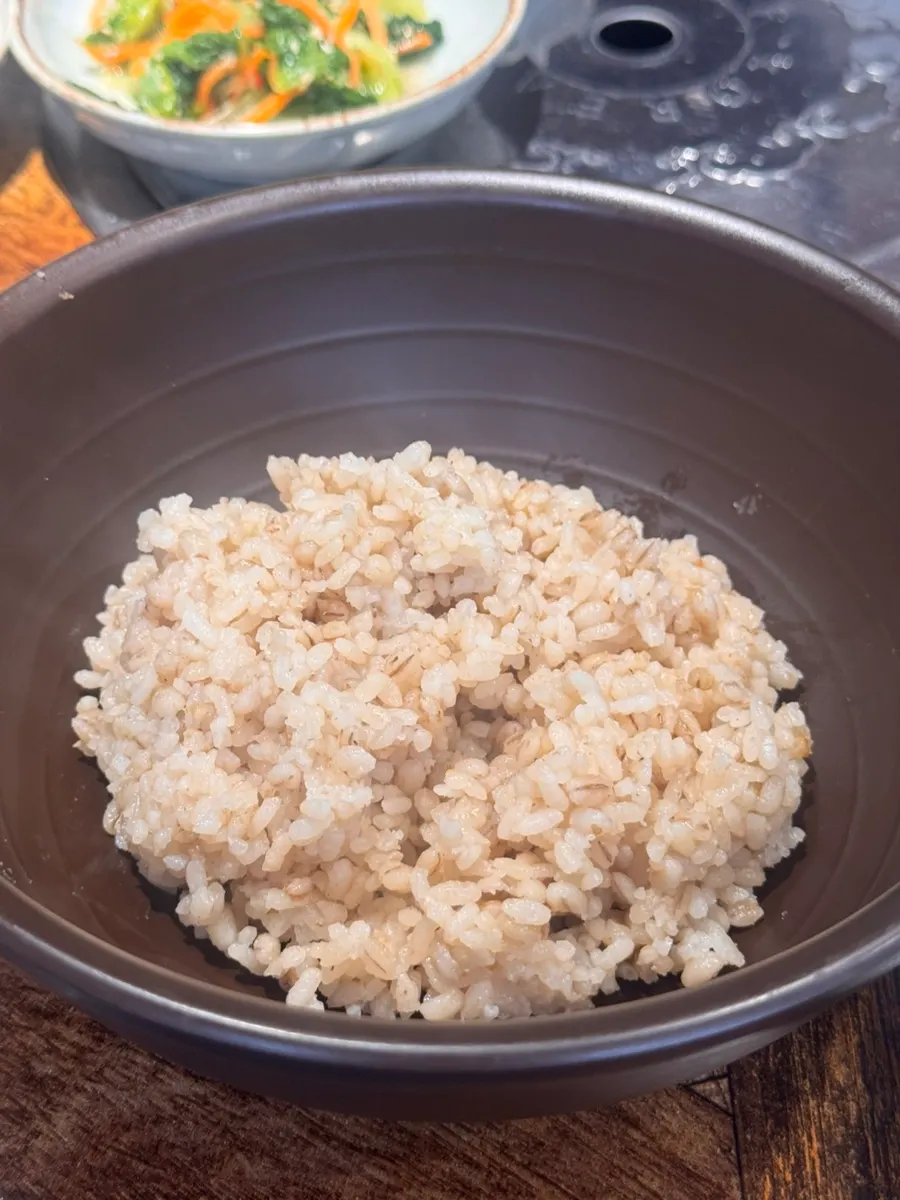 Bowl of barley rice mixed with barley grains