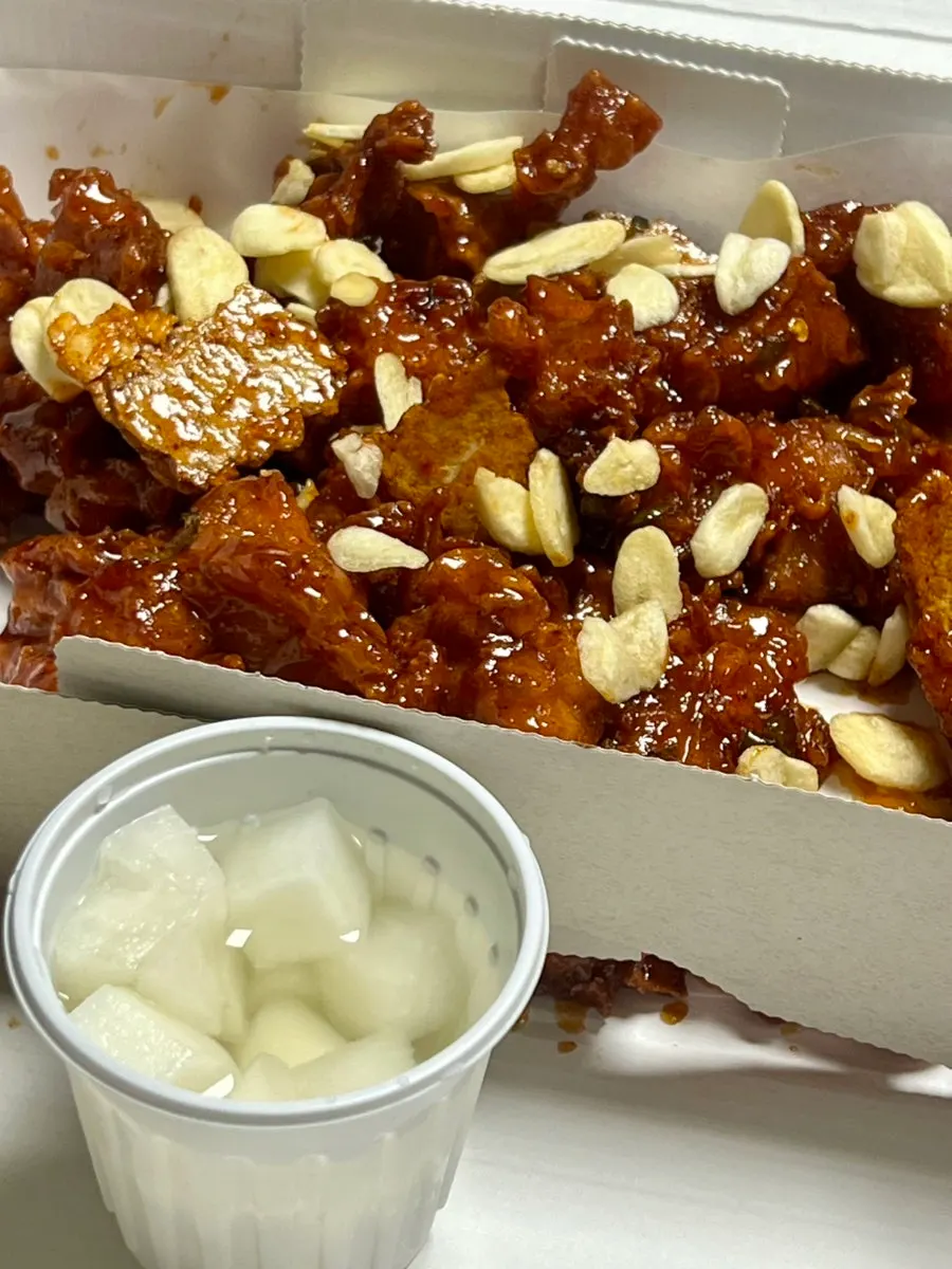 Chewy dakgangjeong and crunchy nurungji