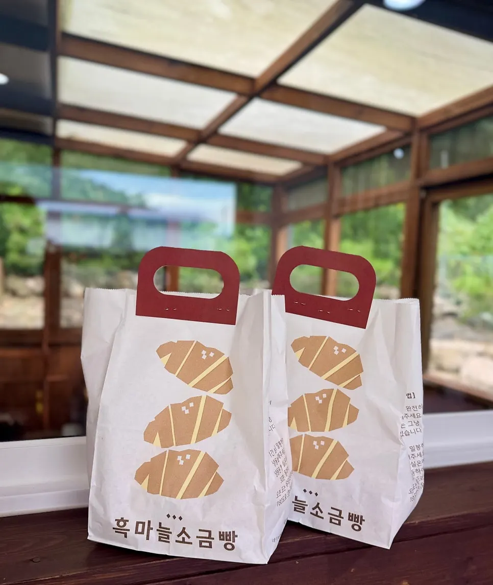 Salt bread packed in a handled bag