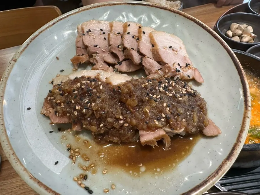 Black garlic pork topped with black garlic sauce