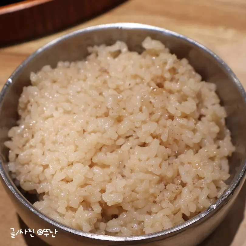 A bowl of black garlic nutrition rice with its subtle color