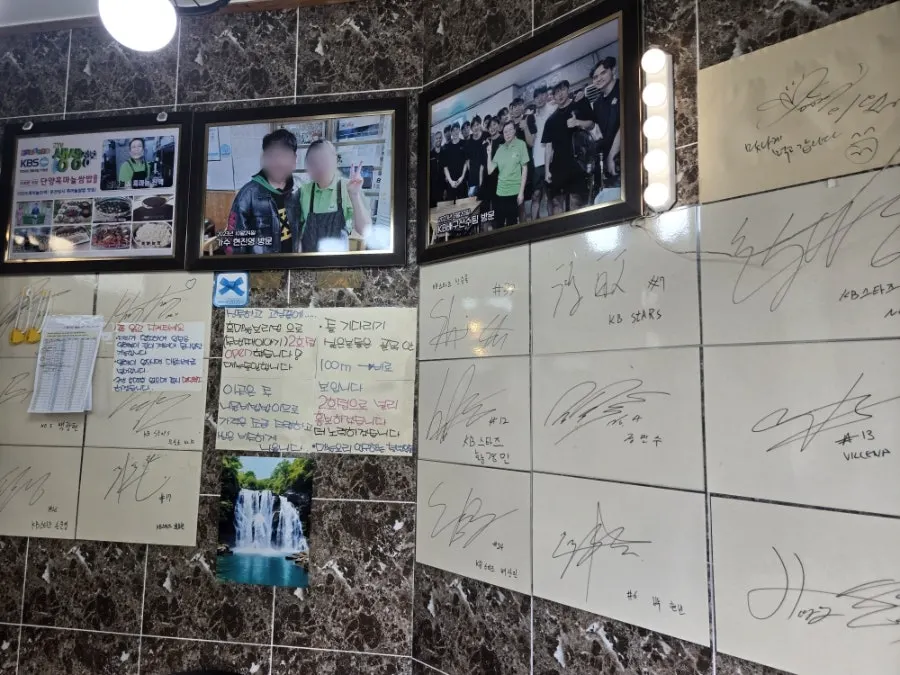 Interior wall with broadcast feature memorabilia