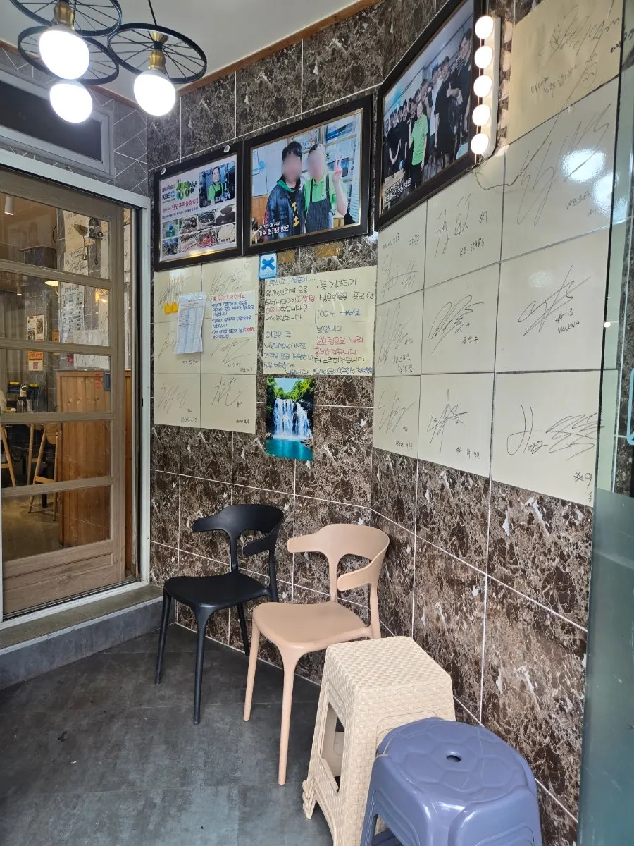 Visitor photos and broadcast feature sign at Danyang Heukmaneul Ssambap