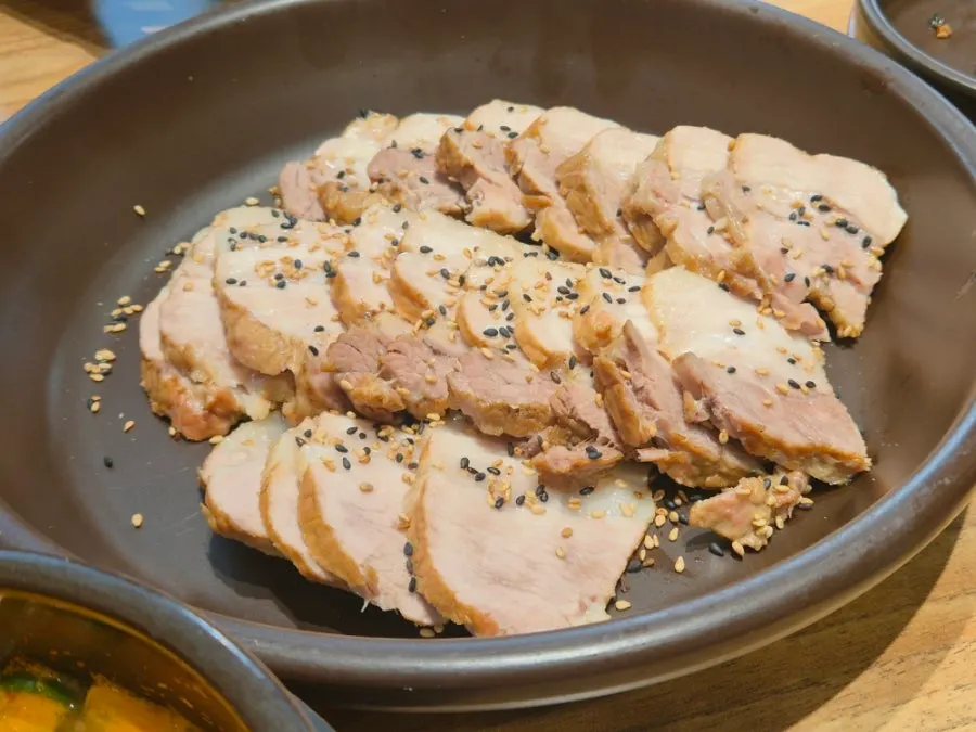 Close-up of garlic sauce and pork