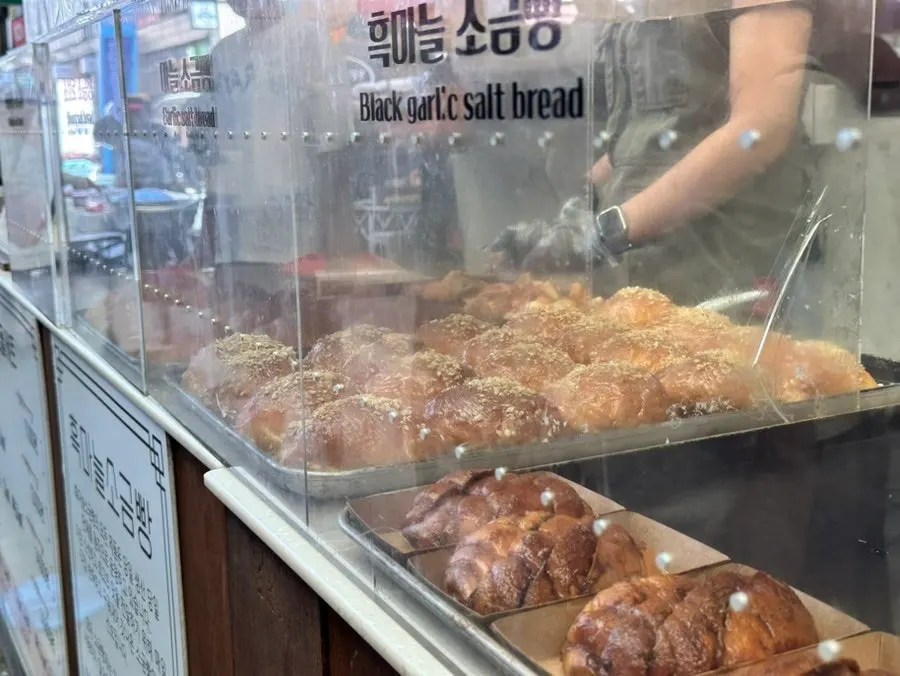 People waiting outside Black Garlic Salt Bread