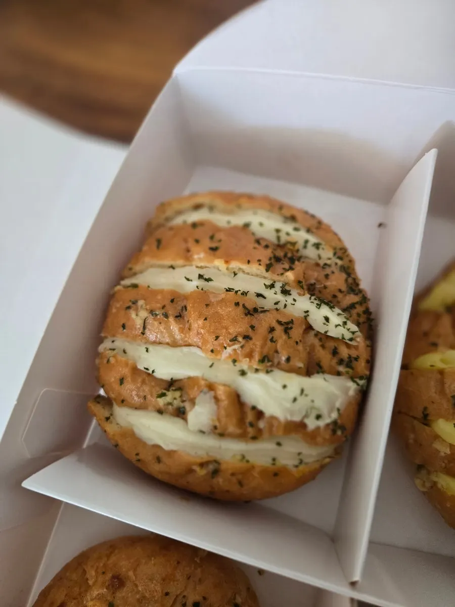 Display case of garlic breads at Danppang Bakery