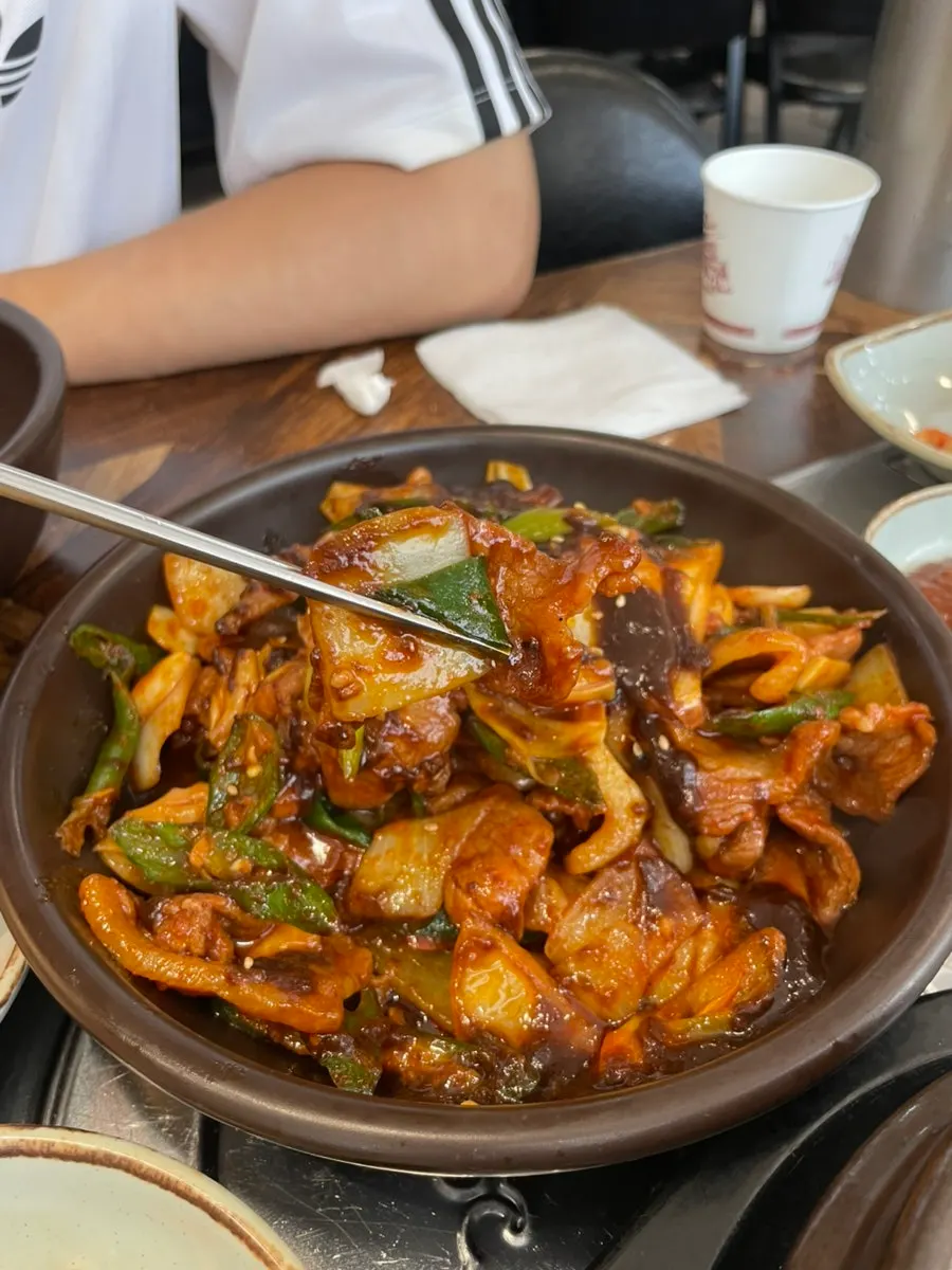 Doenjang jjigae served alongside the jeyuk