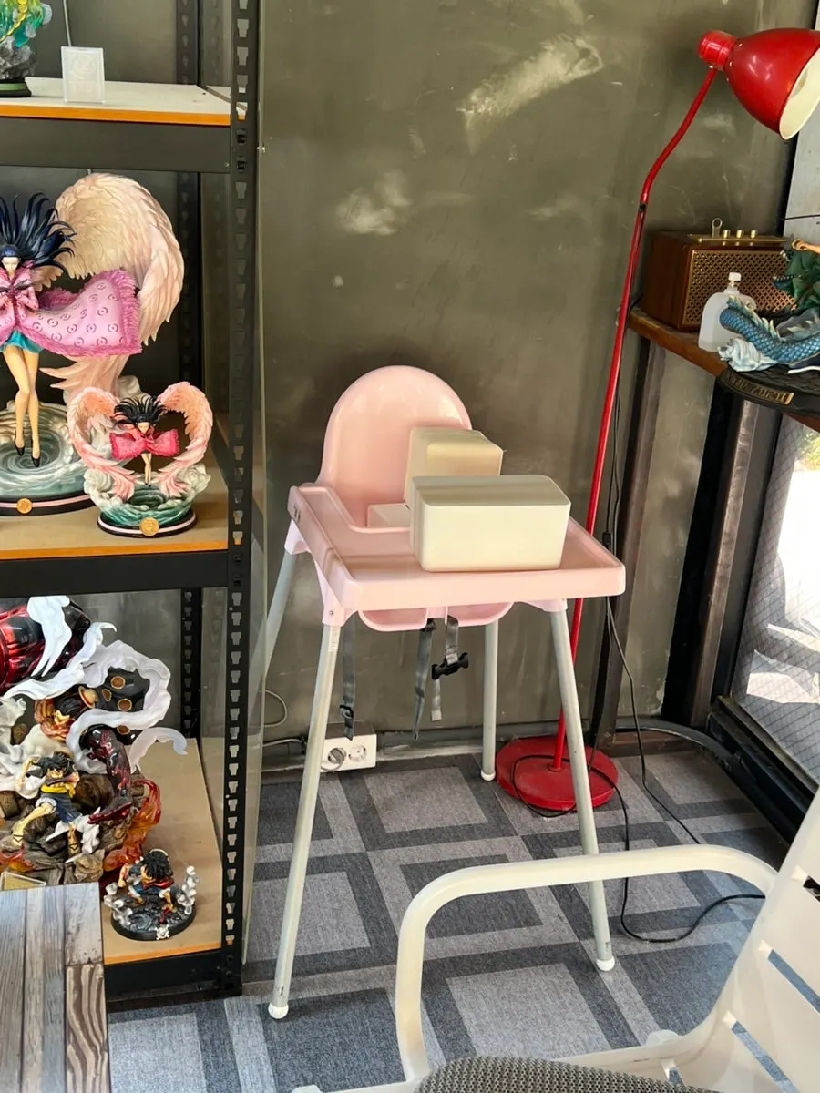 Kids' chair placed inside JB Coffee