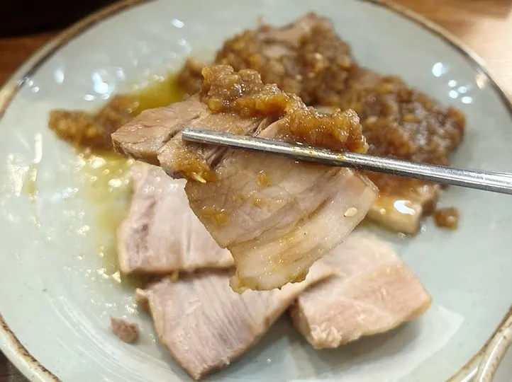Close-up of a slice of bossam with balanced fat