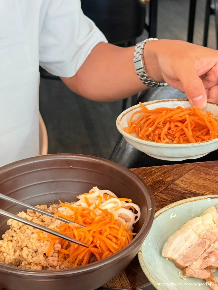 Black garlic jeyuk served over rice