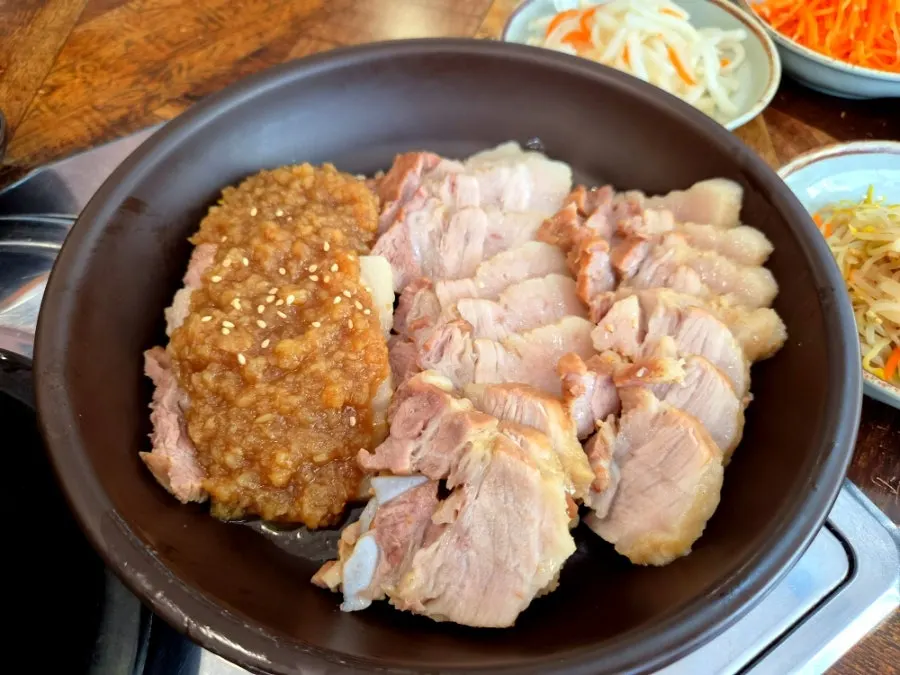 A plate of black garlic boiled pork