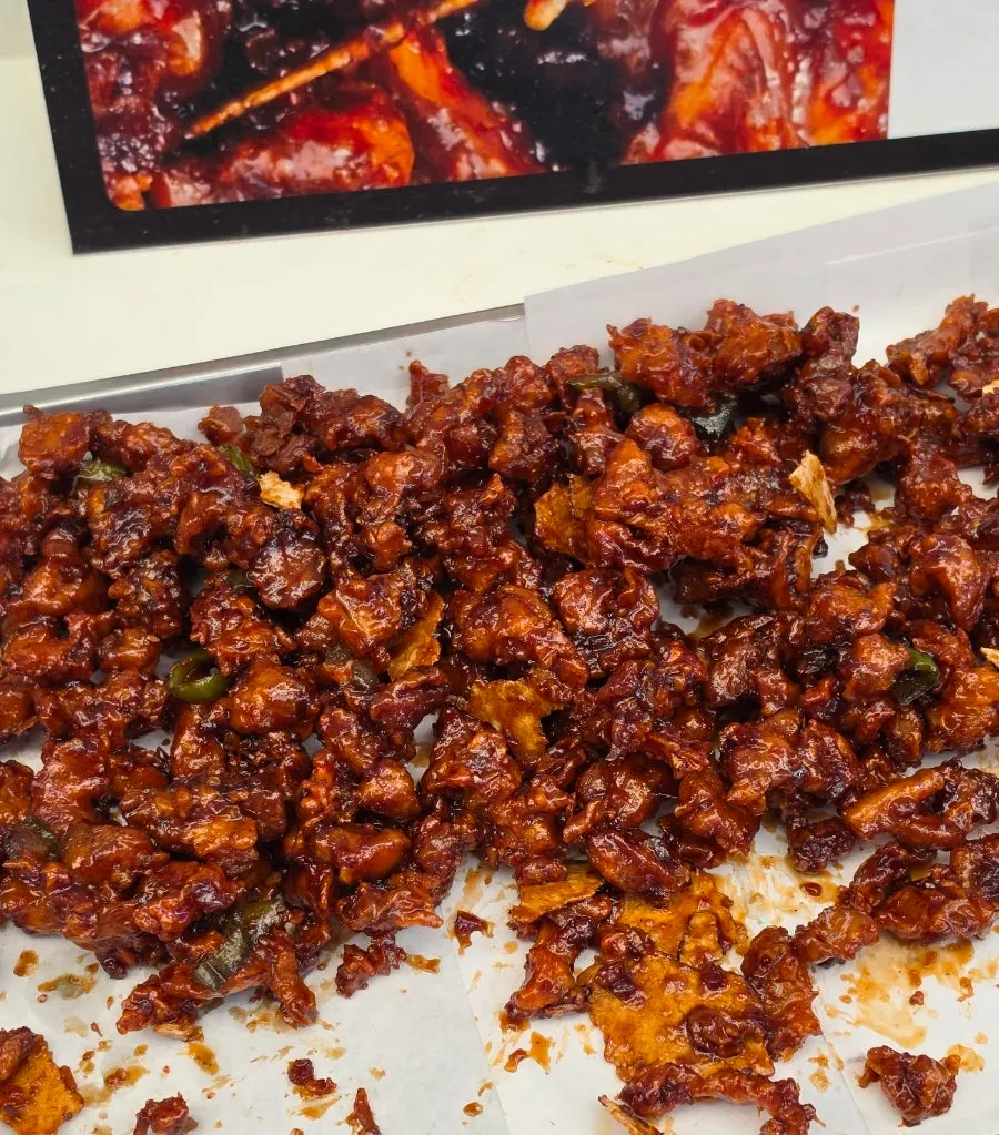 Double-flavor dakgangjeong with black garlic ground into the sauce