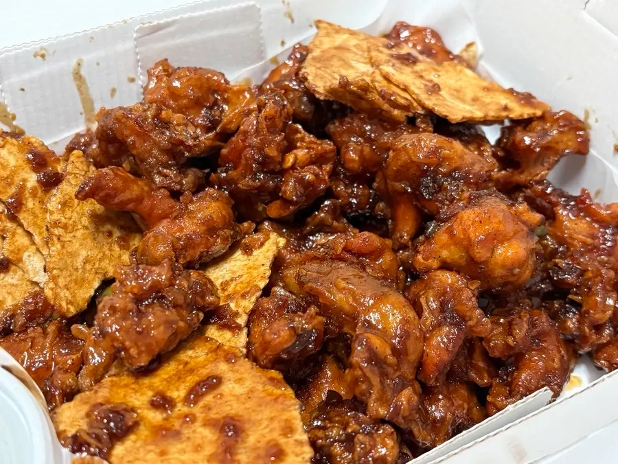 Close-up of dakgangjeong evenly coated in seasoning