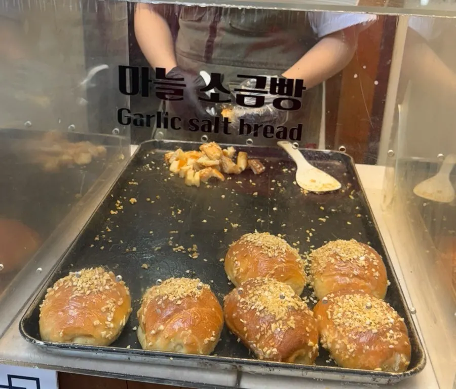 Garlic salt bread topped with garlic on display