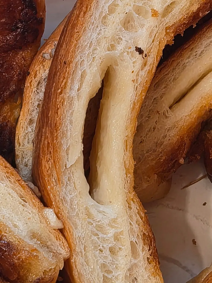 Cross-section of salt bread showing the butter cave