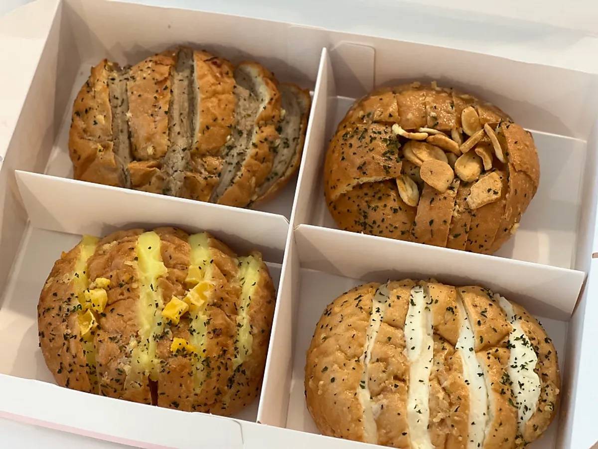 Box of Danppang Bakery garlic bread taken out at home